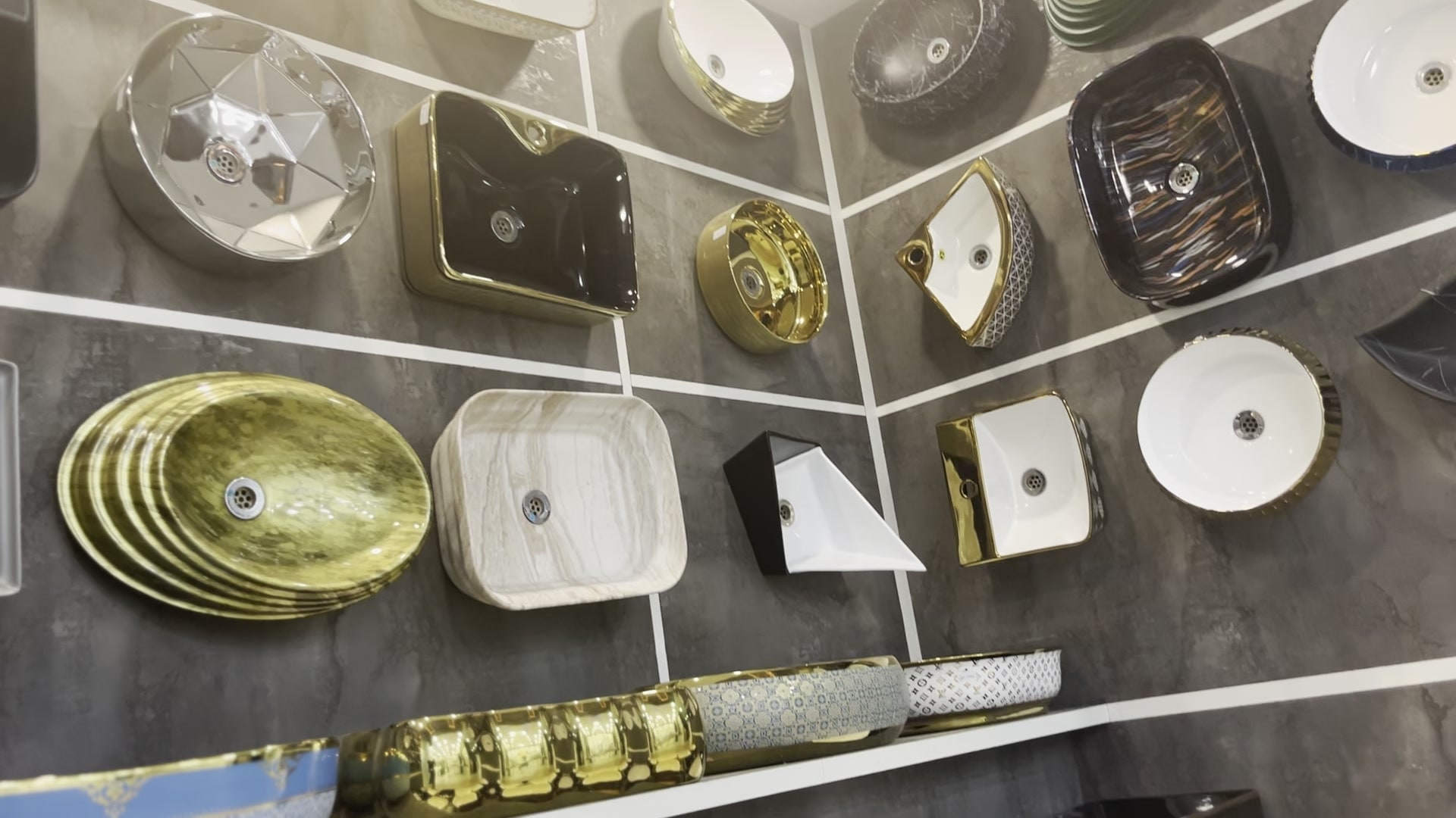 Designer counter-top basins in patterned and metallic finishes