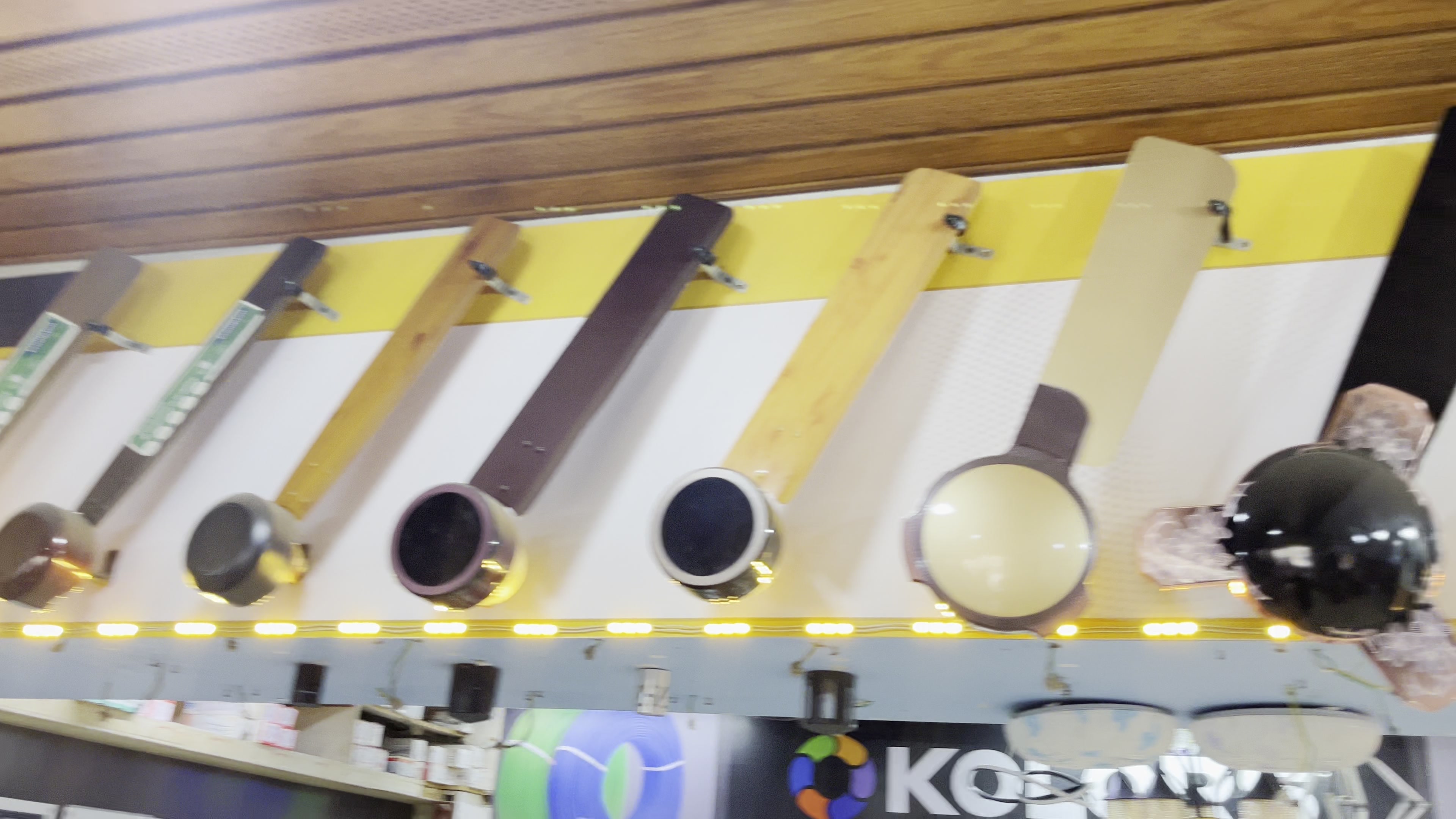 Ceiling fans displayed in rows on the appliances wall